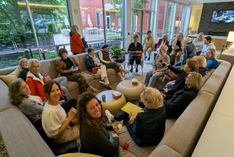 Venus sisters convening in the hotel lounge to plan the next day's rides