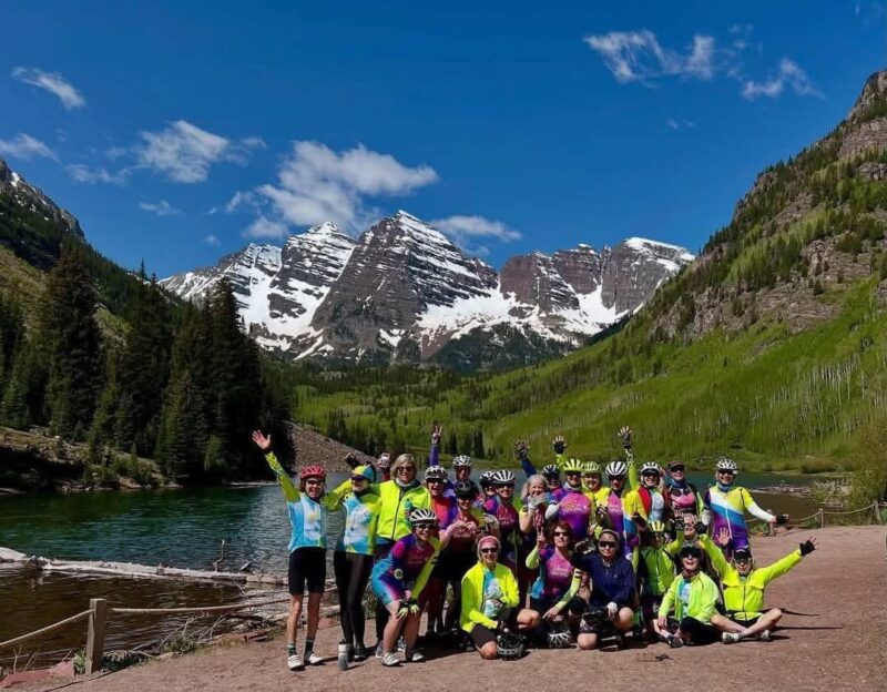 Venus sisters posing with Maroon Bells in the background