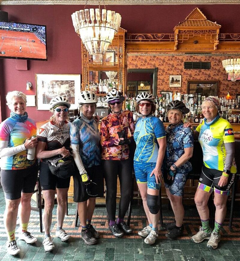 Venus sisters posing in front of a bar in Woody Creek, CO