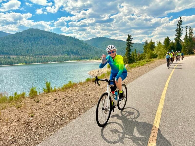 Smiling Venus member riding along Lake Dillon