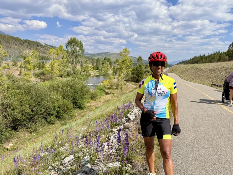 Venus member posing along a bike path