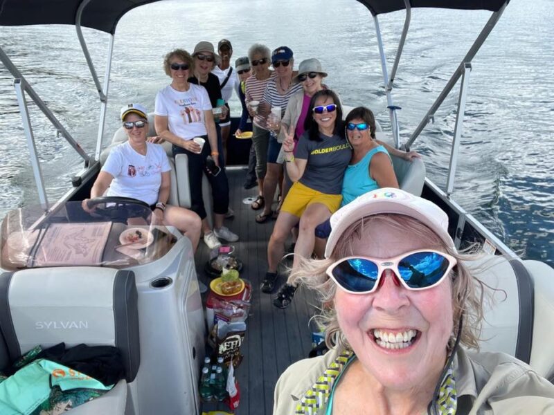 Eleven Venus members onboard a pontoon