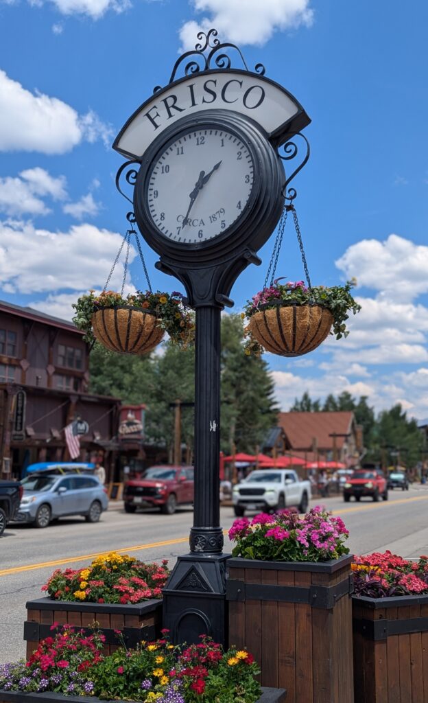 Clock and flowers in downtown Frisco