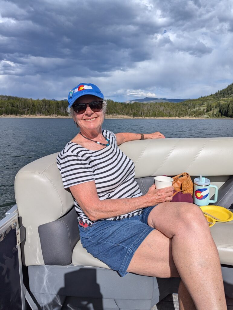 Venus member on a pontoon, smiling